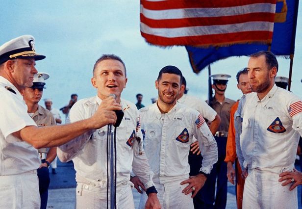 the_crew_of_apollo_8_addresses_the_crew_of_the_uss_yorktown_after_a_successful_splashdown_and_recovery
